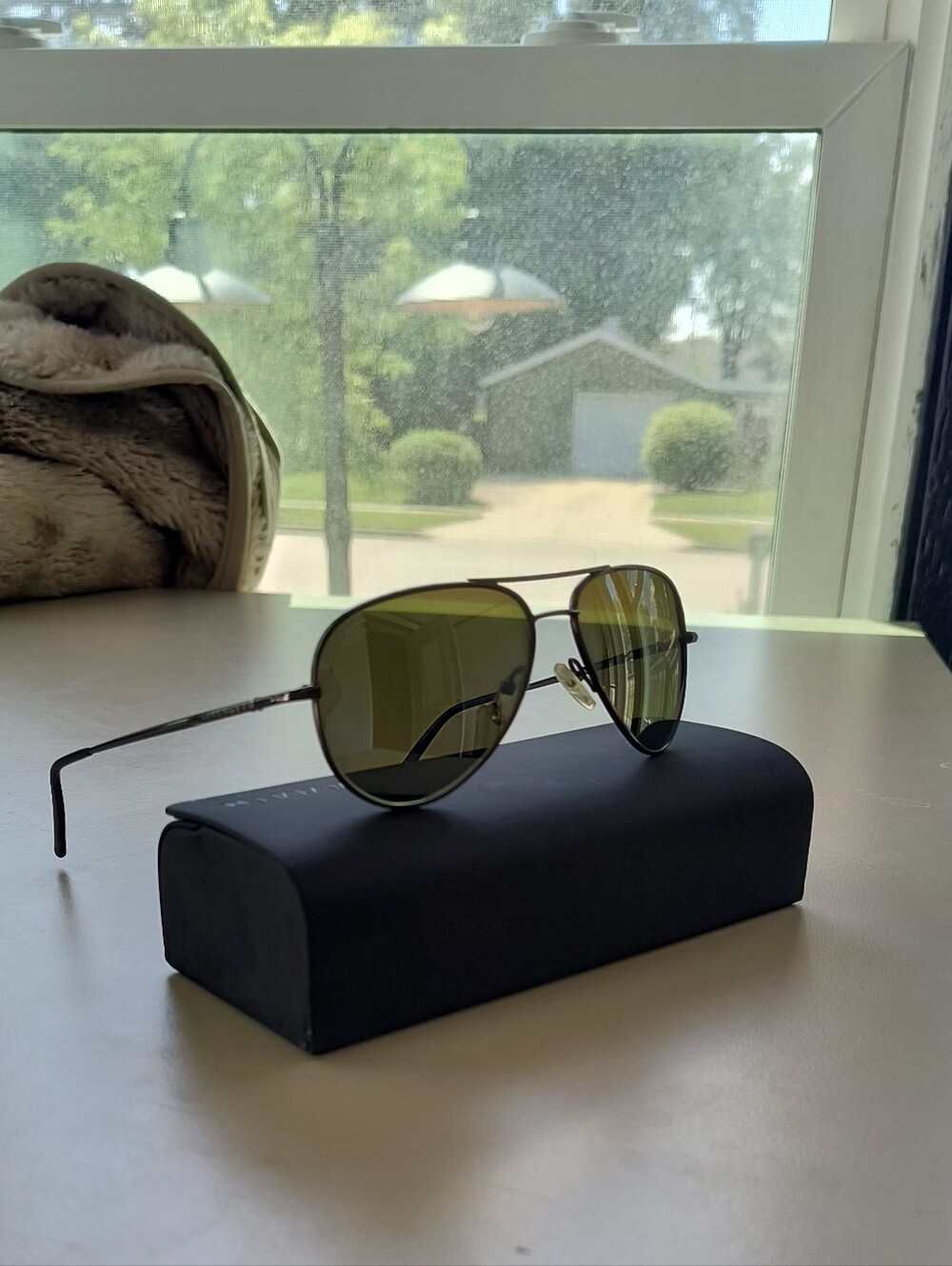 Serengeti Aviator Style Sunglasses with Dark Green Lenses